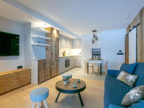 Cocon intime avec WiFi, garage, et accès direct aux pistes dans résidence neuve à Val d'Isère - FR-1-694-339